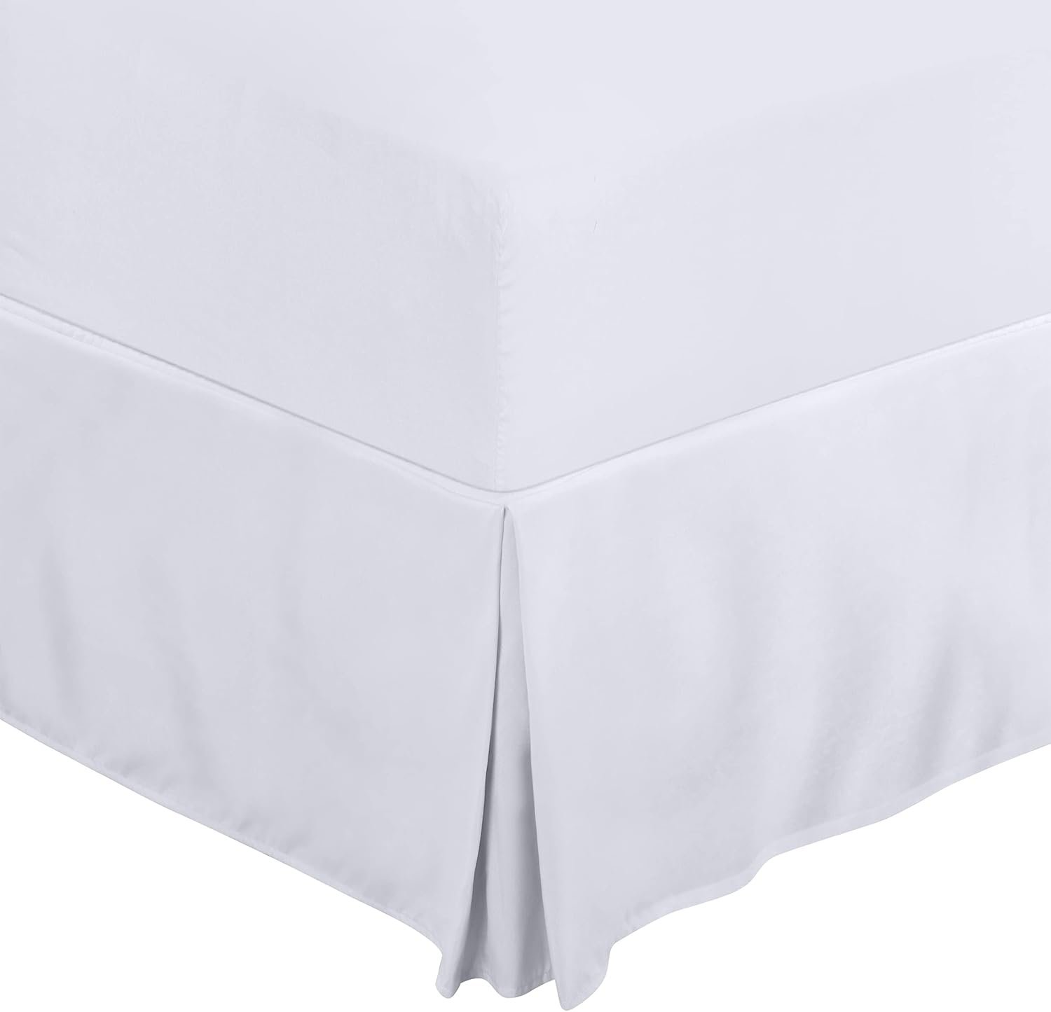 "White bed skirt draped elegantly over the base of a bed, adding a clean and classic touch to the bedding setup. The fabric has a smooth texture and falls gracefully to the floor."