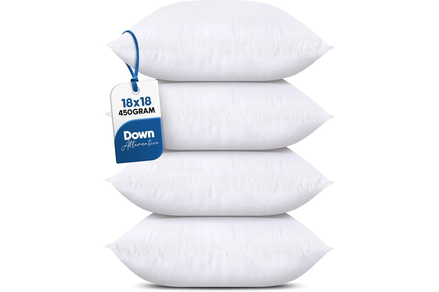 Four white pillows arranged neatly on a bed. The pillows are evenly spaced and feature a crisp, clean appearance, adding a fresh and inviting look to the bedding